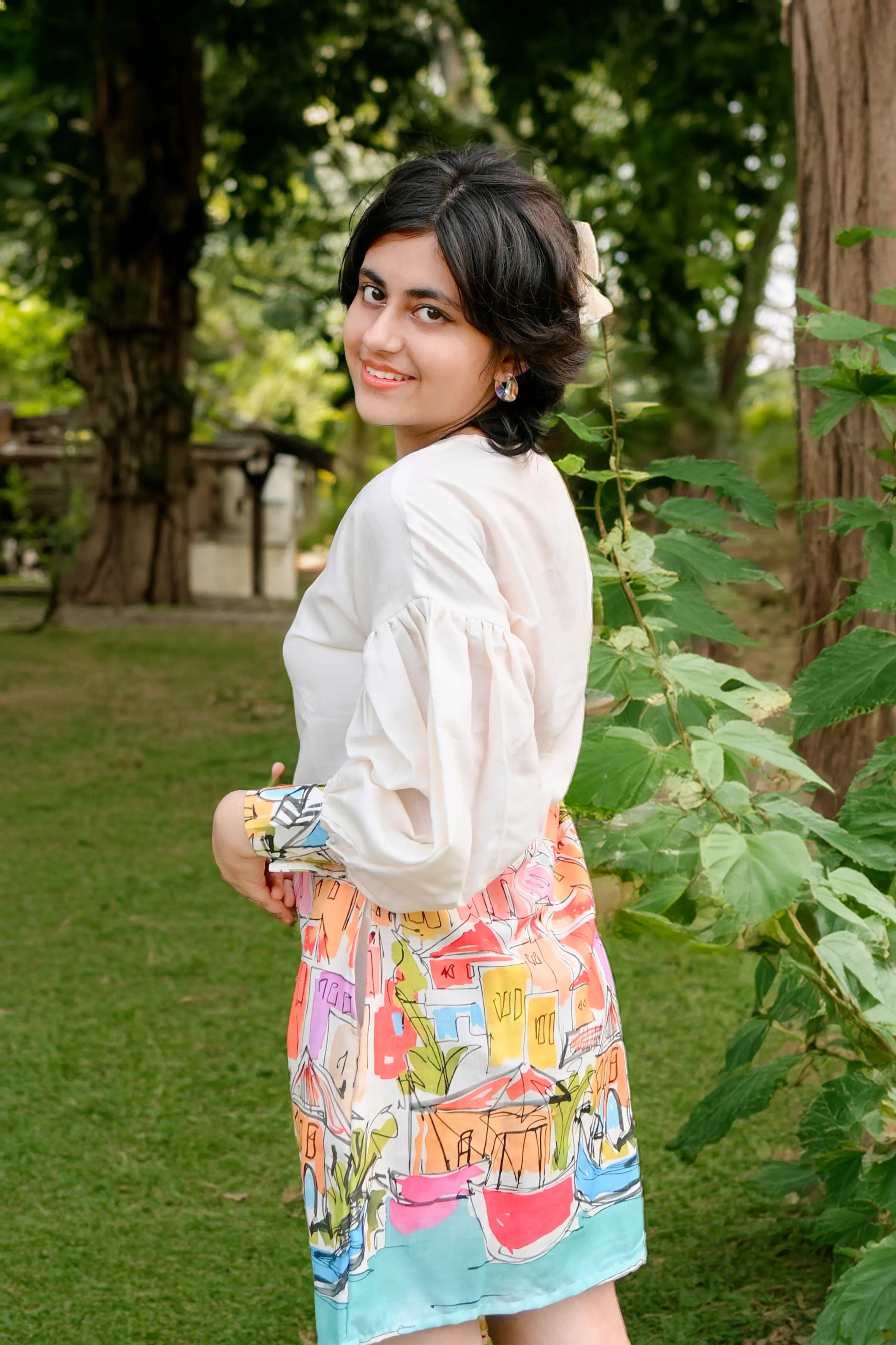 Printed cotton kurti with balloon sleeves and colorful artistic design